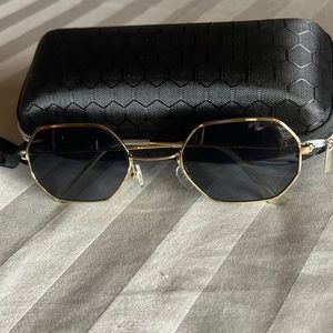 Gold rimmed Sunglasses